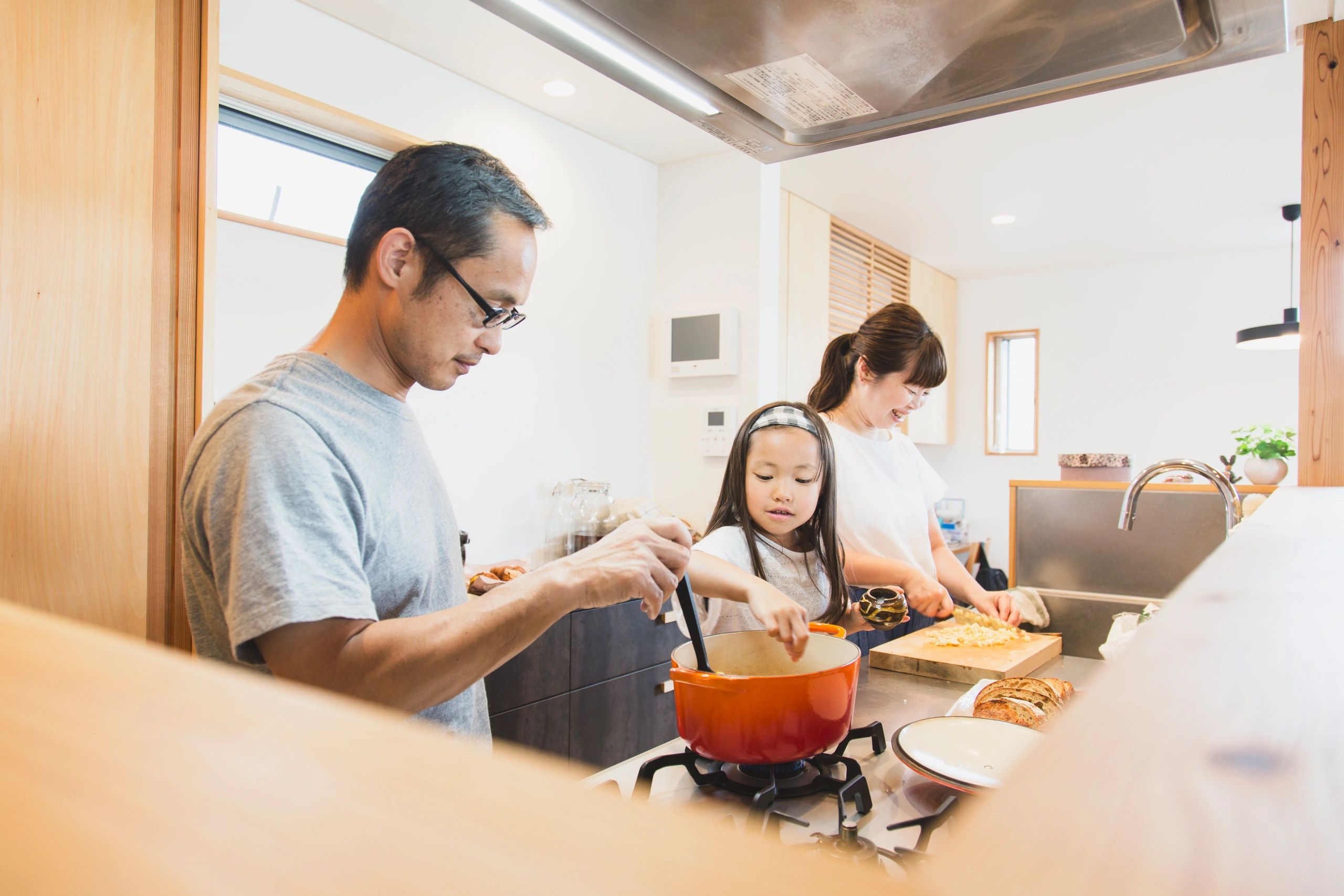 Family cooking together in the kitchen